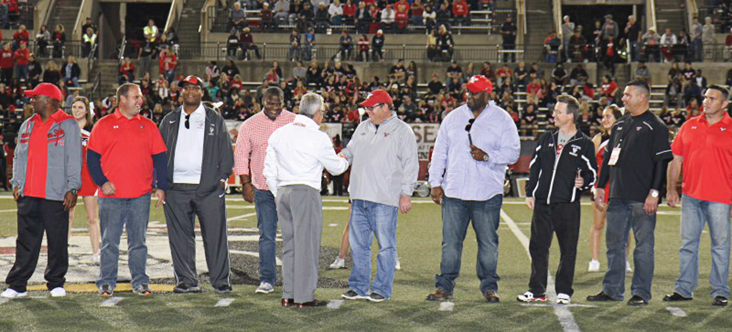 Members of the 1991 National Championship team at the 25th anniversary celebration in 2016.