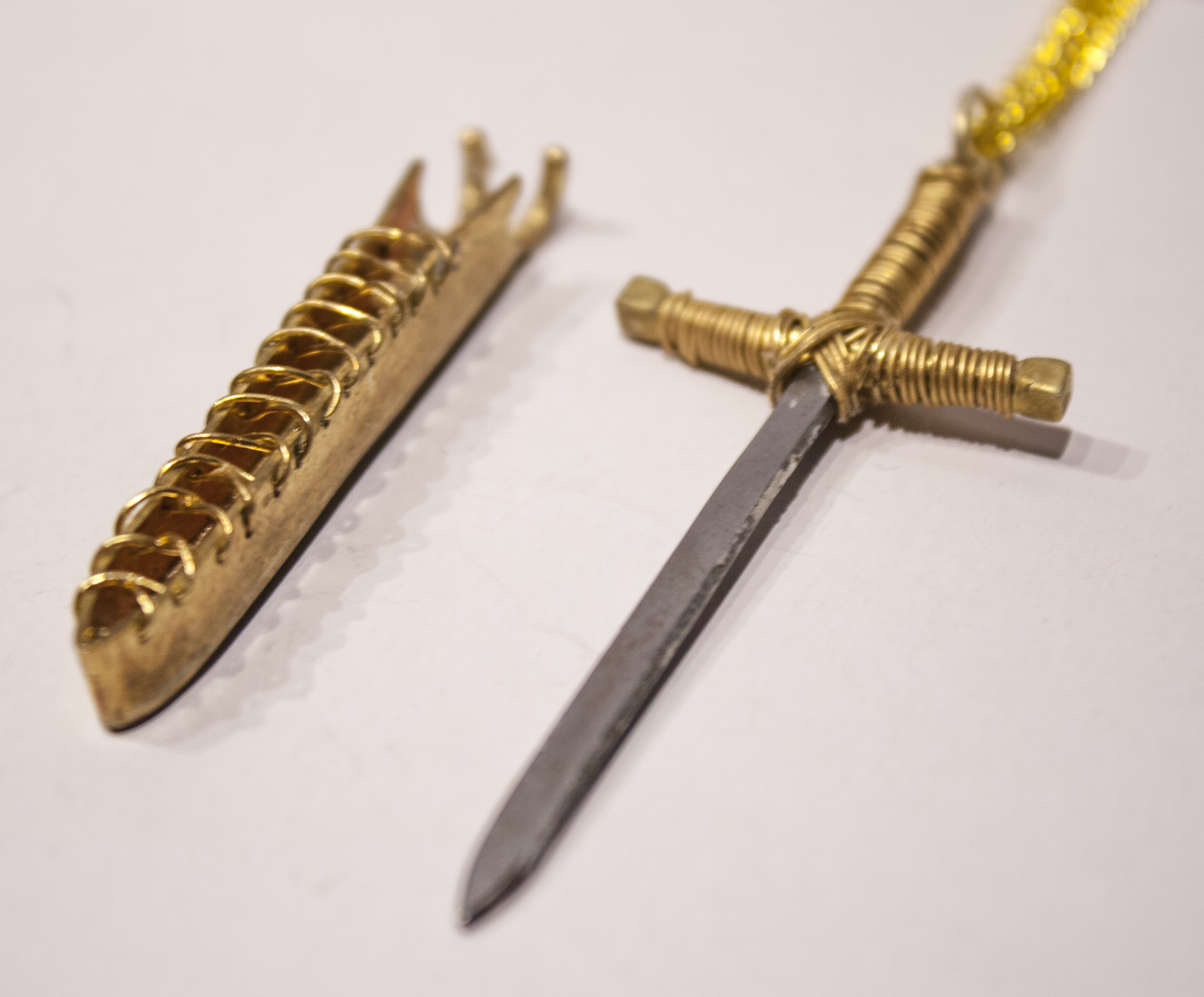 A metal knife and knife case