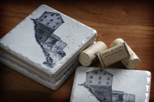 Coasters with a drawing of Mill Creek Park on the surface