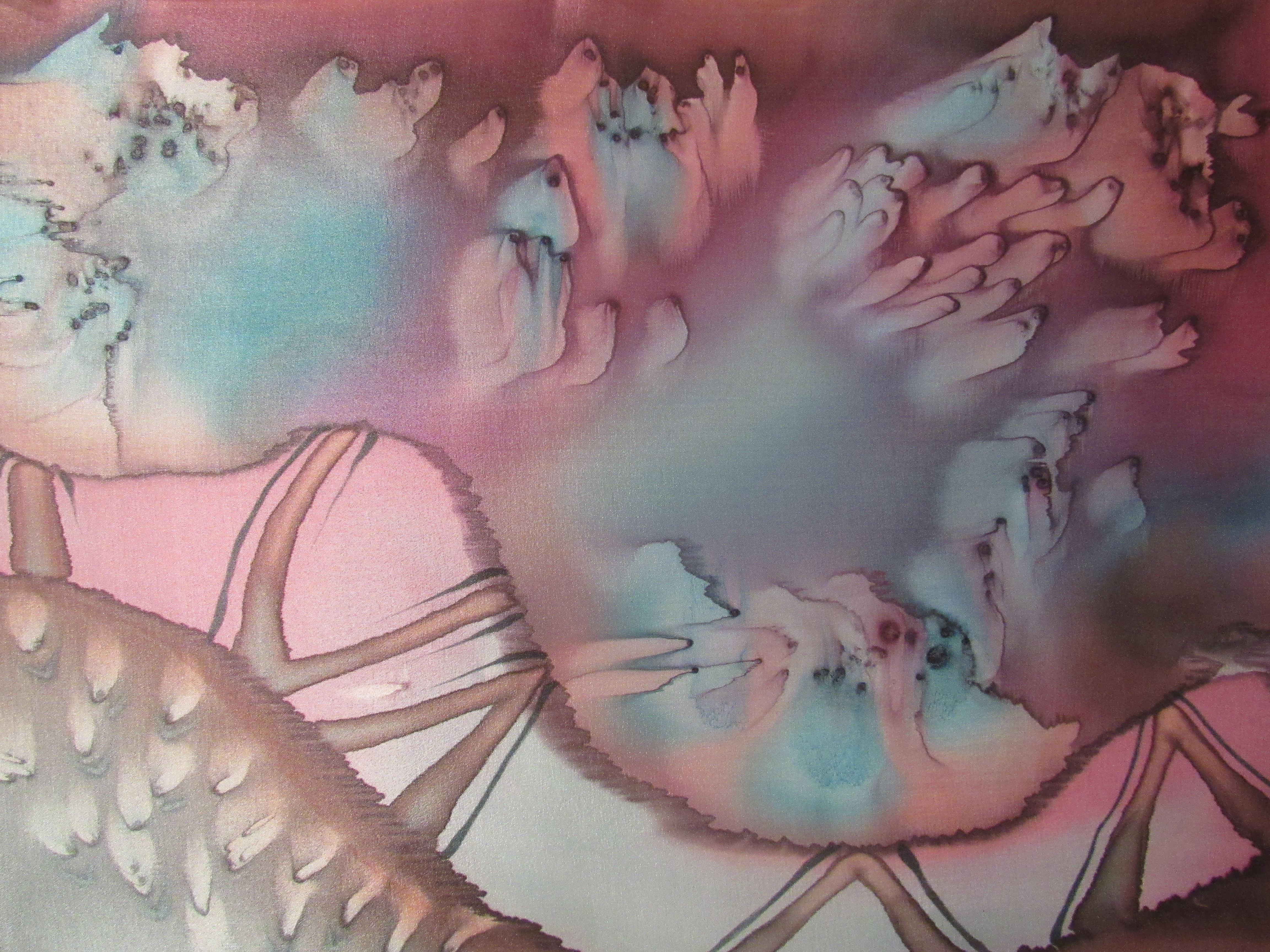 A piece of artwork with pink, tan and blue drops on the surface