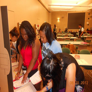 Group members doing paperwork during Summer Program 2012