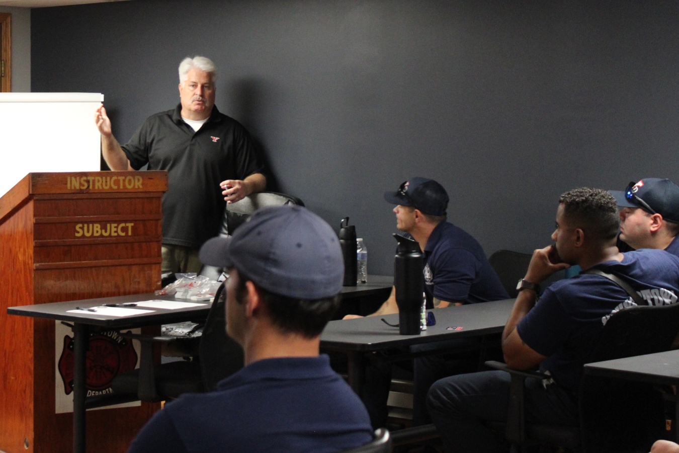 Carl DeCarlo, program director for YSU's Fire Science program presenting to members of the Youngstown Fire department