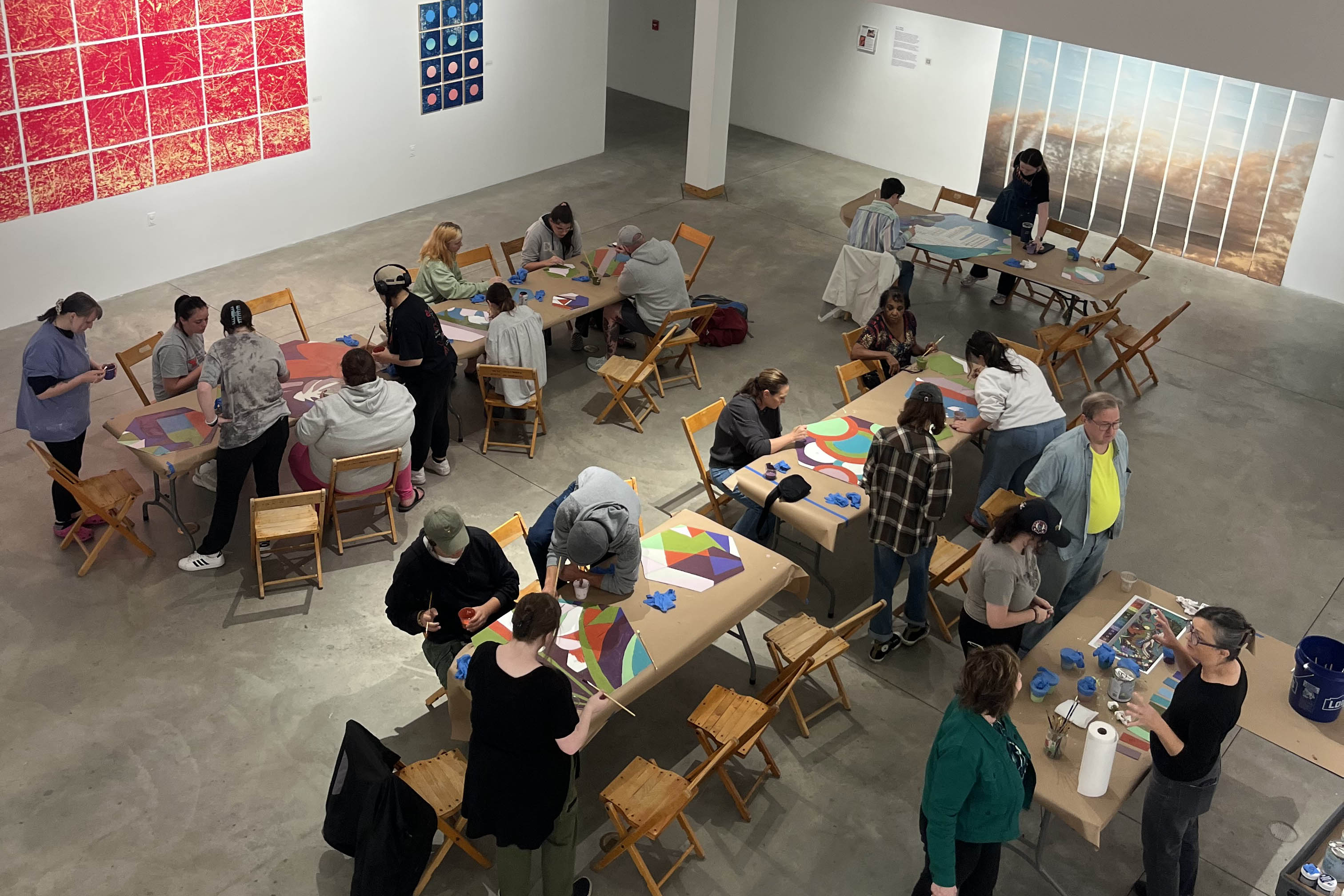  Participants from YSU, Ohio Living and the local community working on a new intergenerational mural now on display at the Butler Institute of American Art