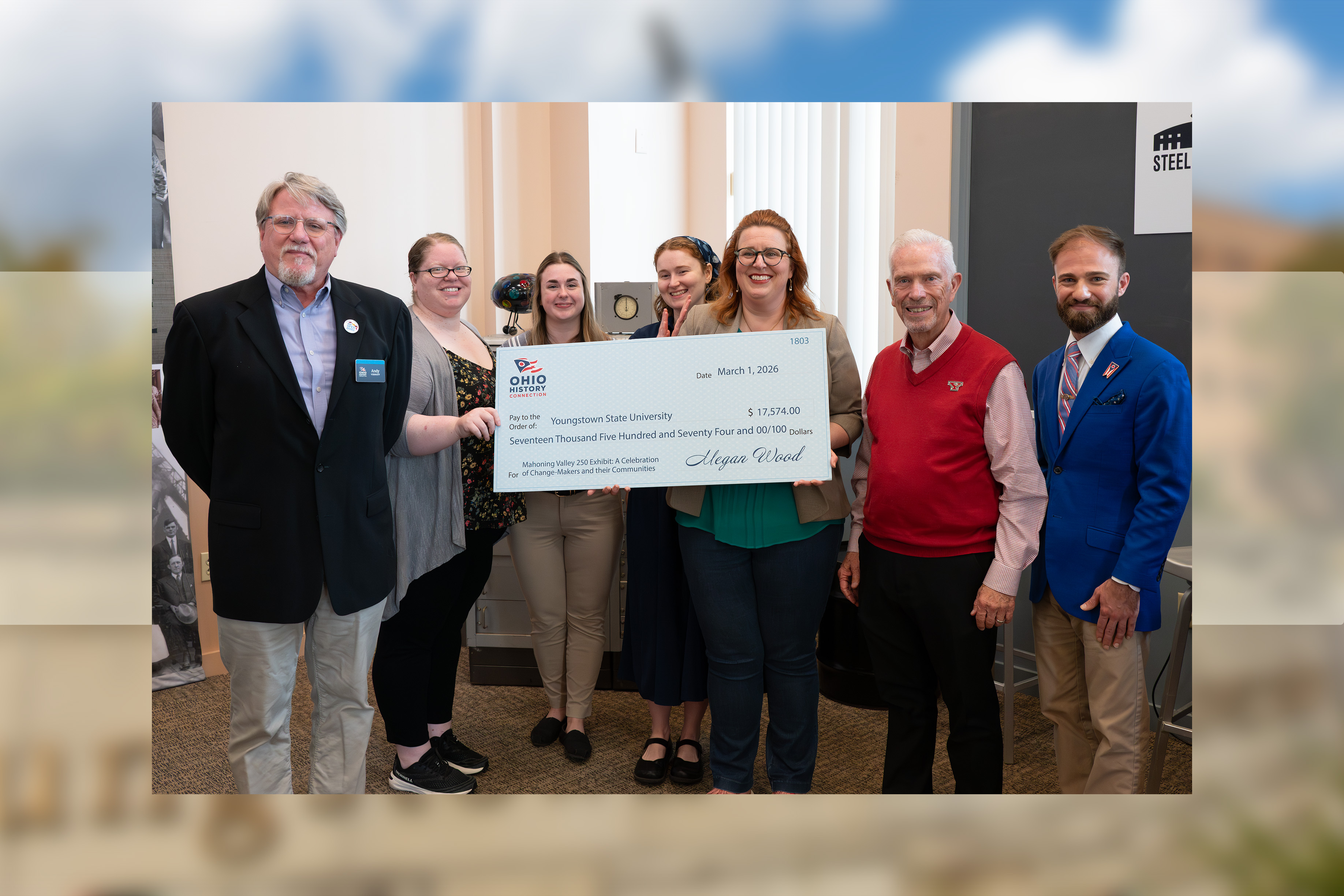 Representatives from the Ohio History Connection present a check to representatives from YSU, the Steel Museum, the Mahoning Valley Historical Society and the Trumbull County Historical Society