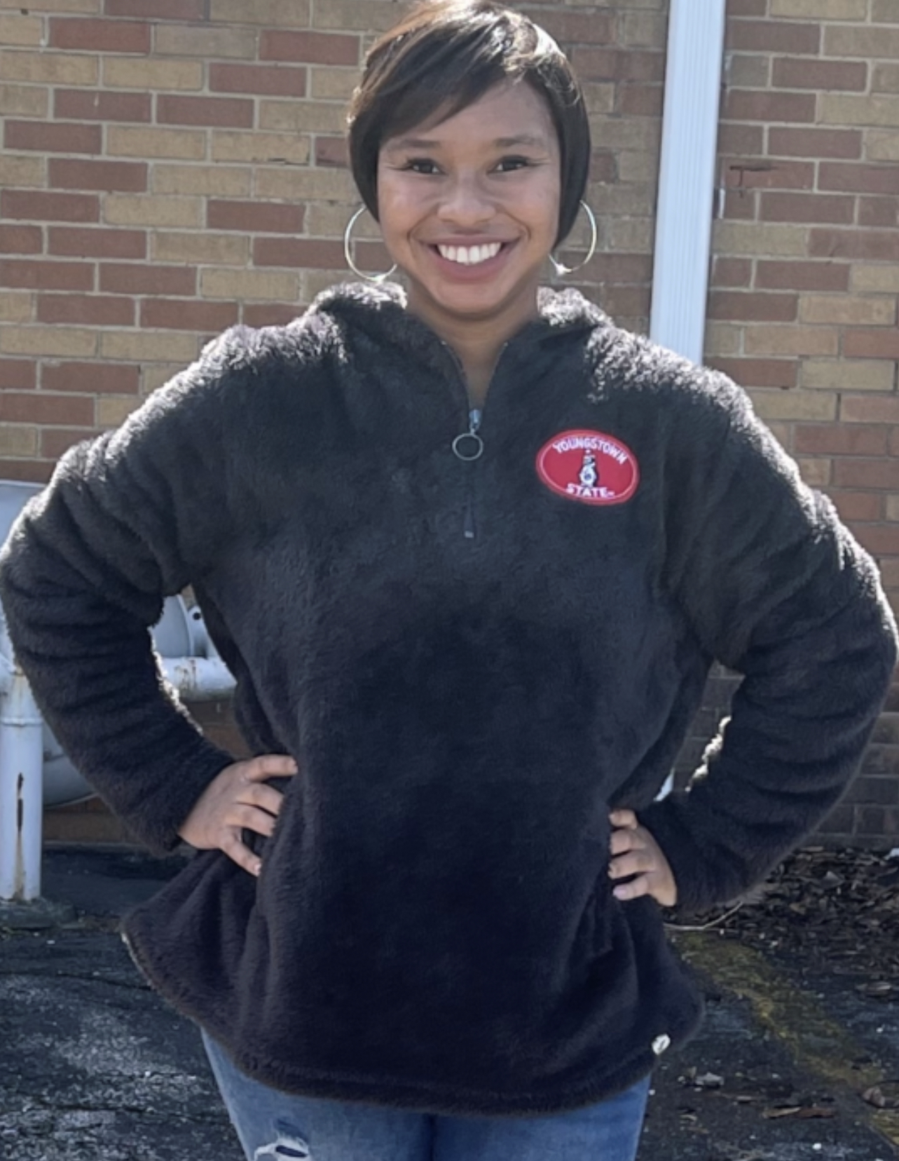 Gabrielle smiling, wearing a YSU hoodie