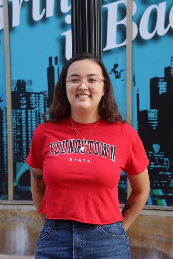 Photo of Jasmine wearing a YSU t-shirt and smiling.