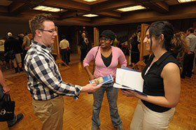 photo of people viewing Quest exhibits