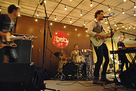 photo of a band playing at The Hub