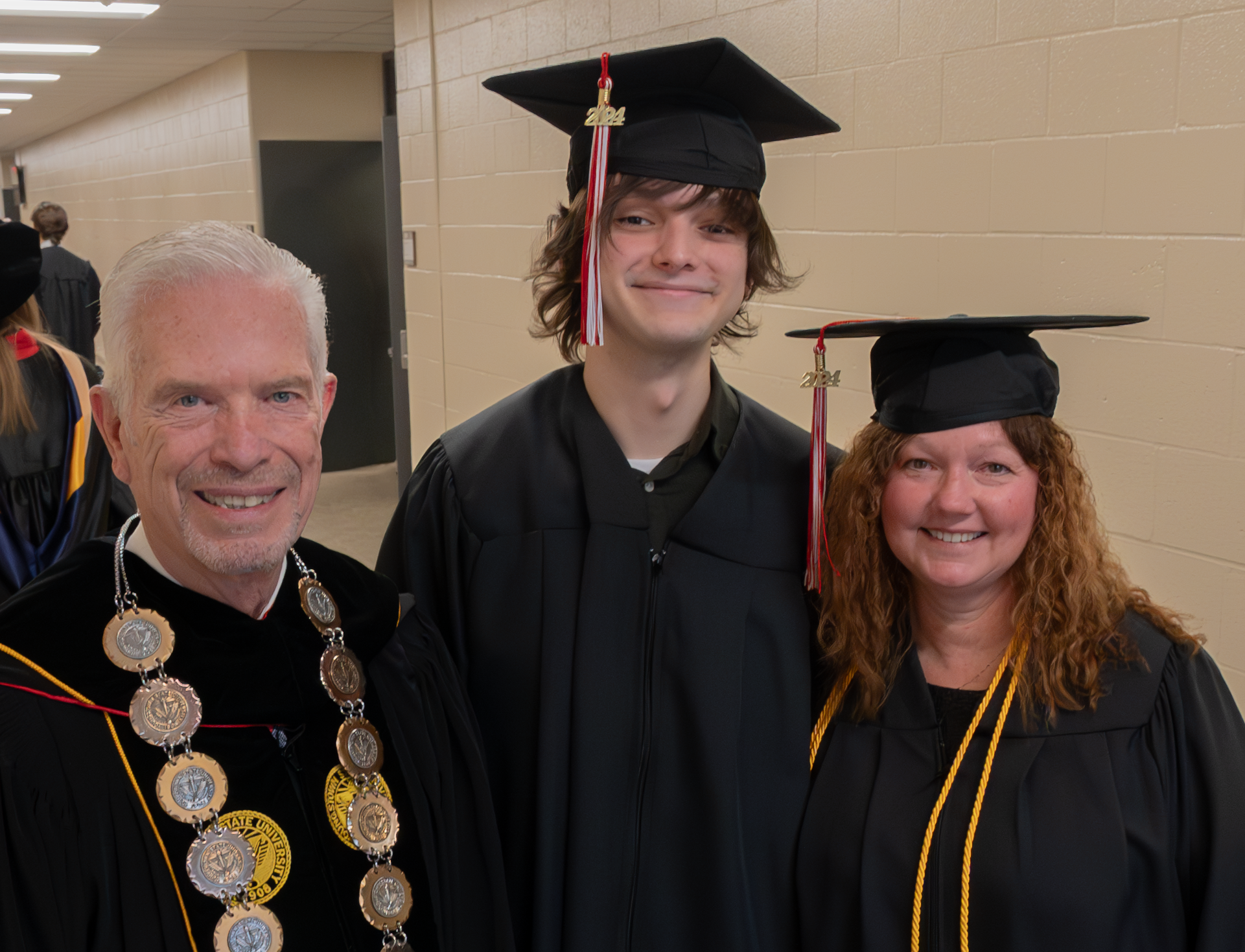 President Bill Johnson with Michael Scolaro and Kim Paulett