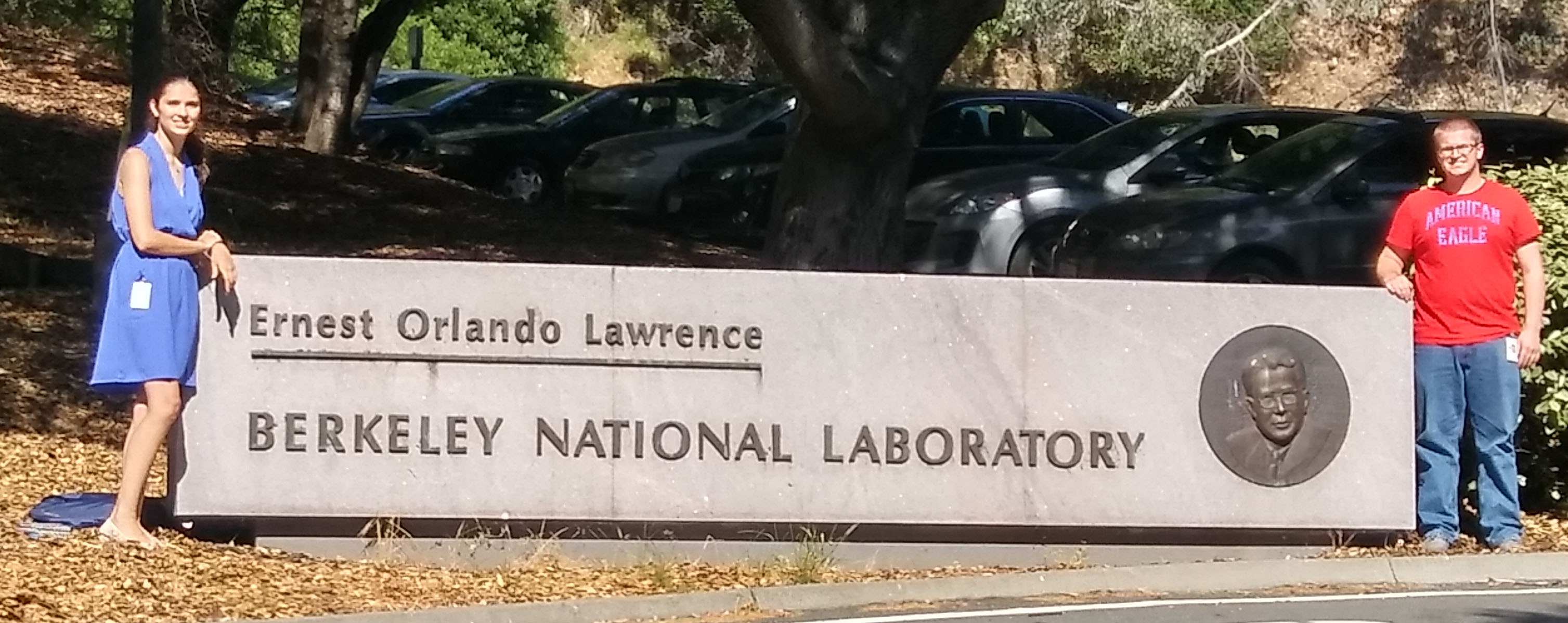 Alexandra Ballow and Tyler Leibengood stand beside the Lawrence Berkeley National Laboratory sign