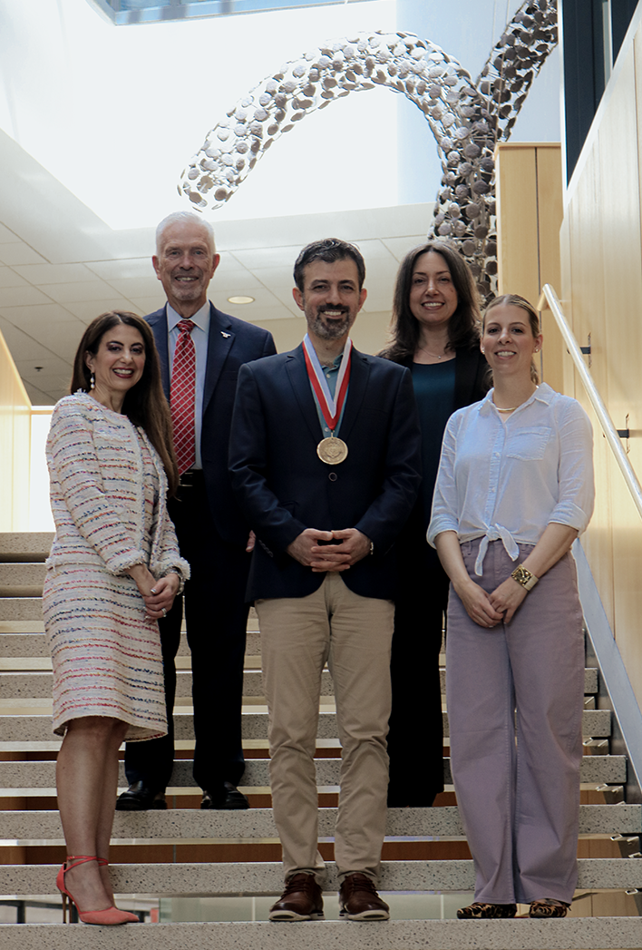 Natalie and Dana Lariccia with Omer Genc, President Bill Johnson and Dean Christina Saenger