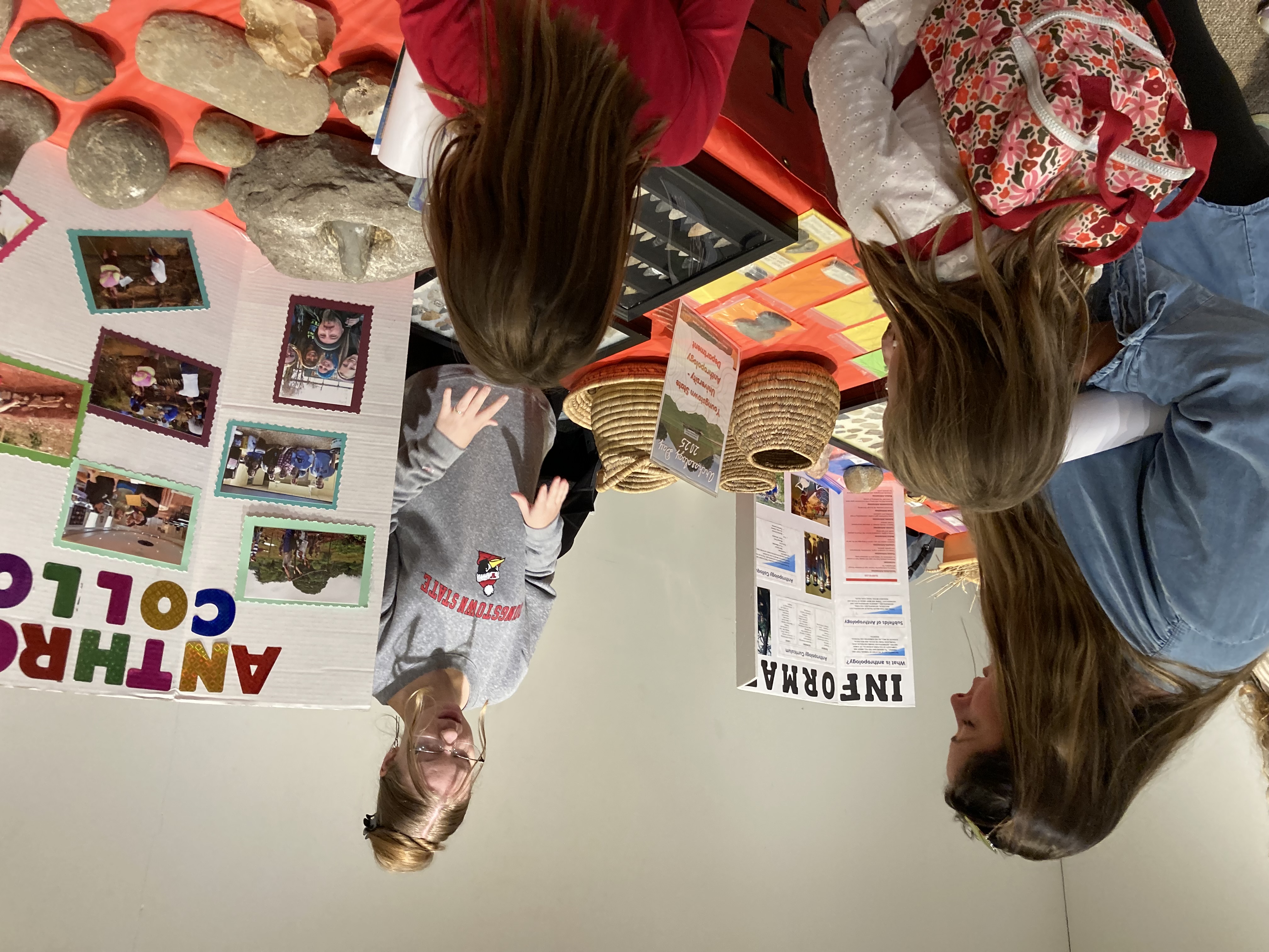 Vanessa Welker answers questions from some of the younger visitors at the display.