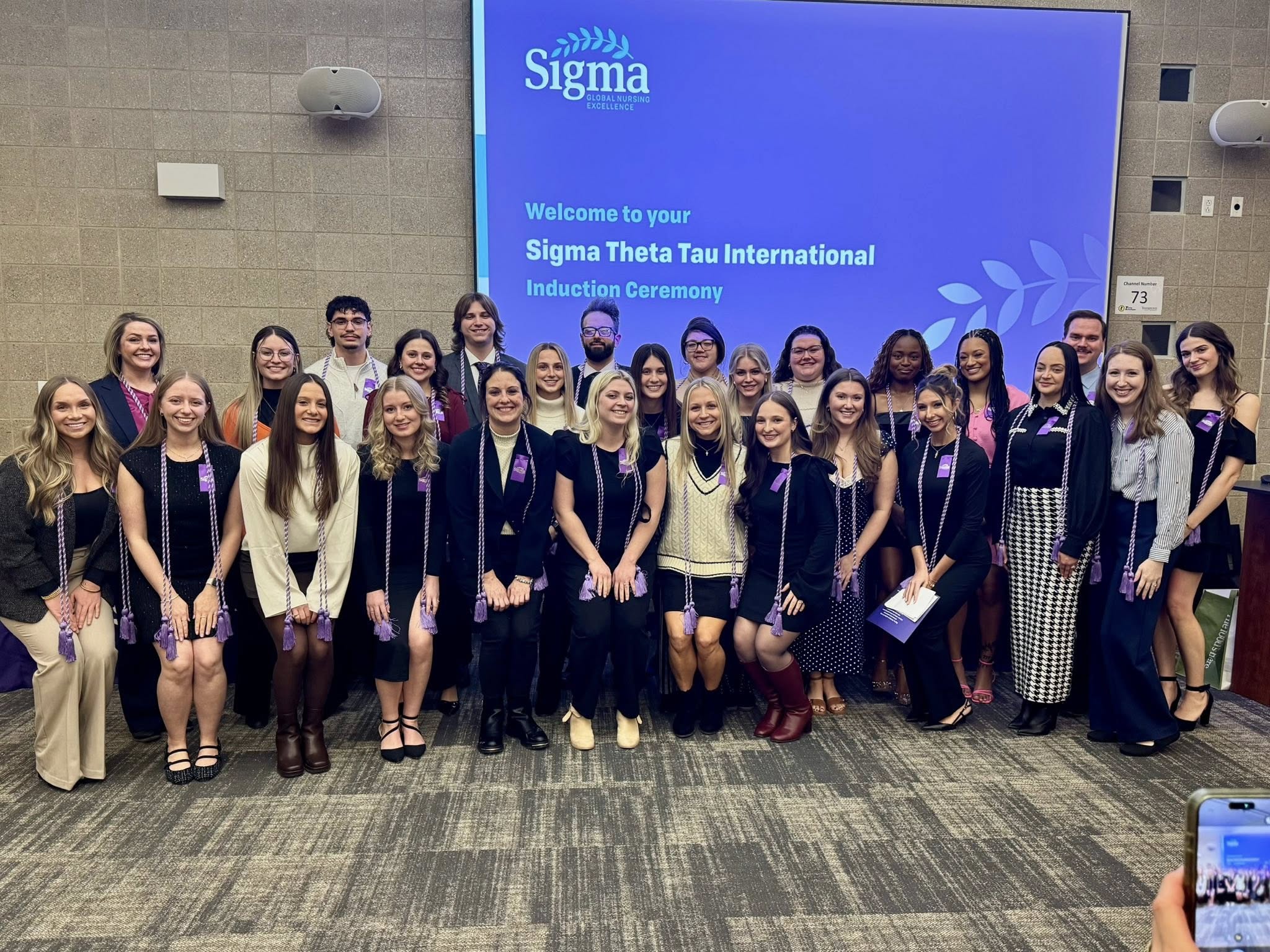 Newly inducted members of the Centofanti School of Nursing's Xi Xi Chapter of Sigma, the International Honor Society of Nursing pose as a group with their honor cords