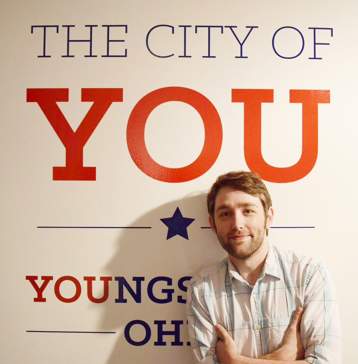 RJ Thompson with the city of you poster 