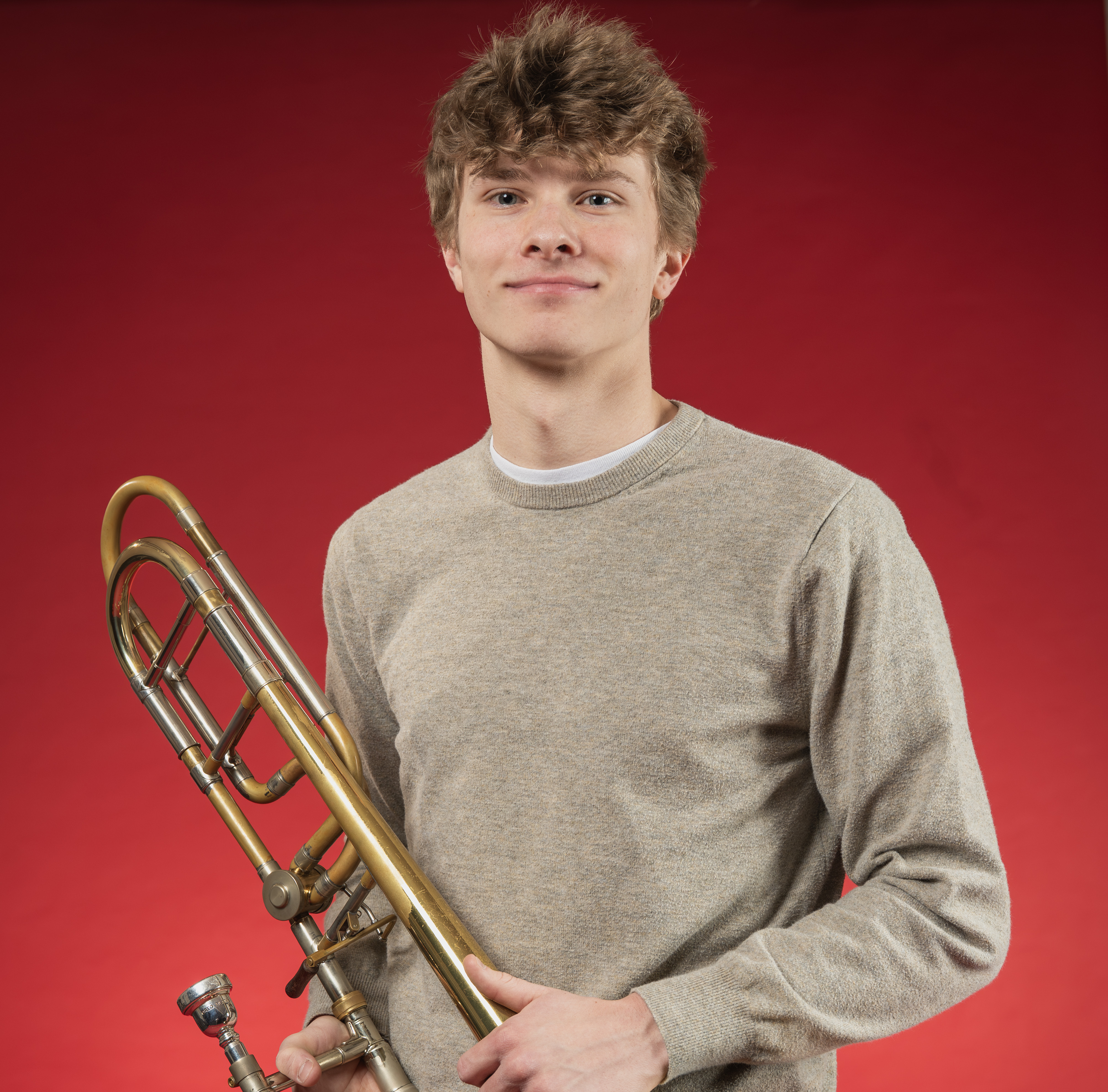 Jacob Norton poses with a Trombone