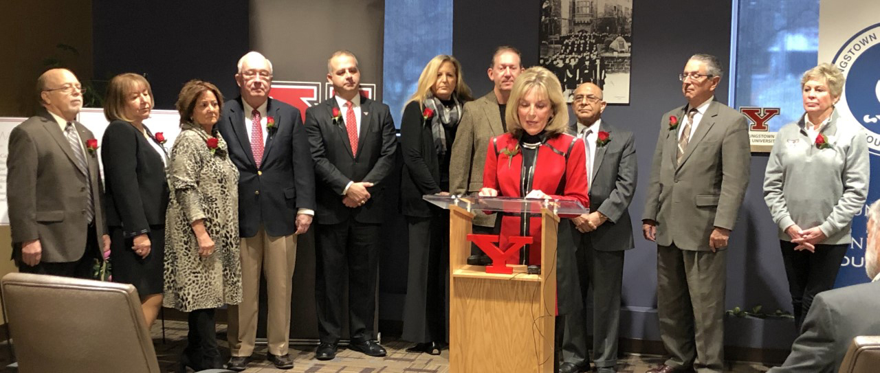 Jocelyne Kollay Linsalata, chair of the "We See Tomorrow" campaign, flanked by members of the campaign cabinet, announces a new campaign goal of $125 million.