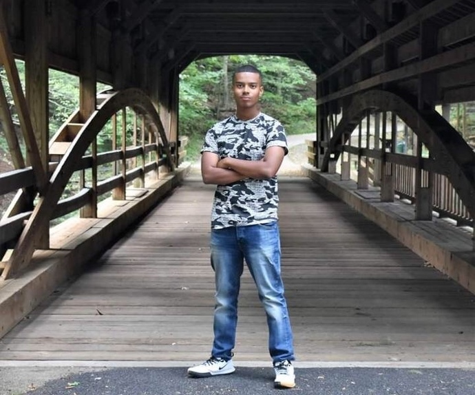 Photo of Scott Gregory under a covered bridge