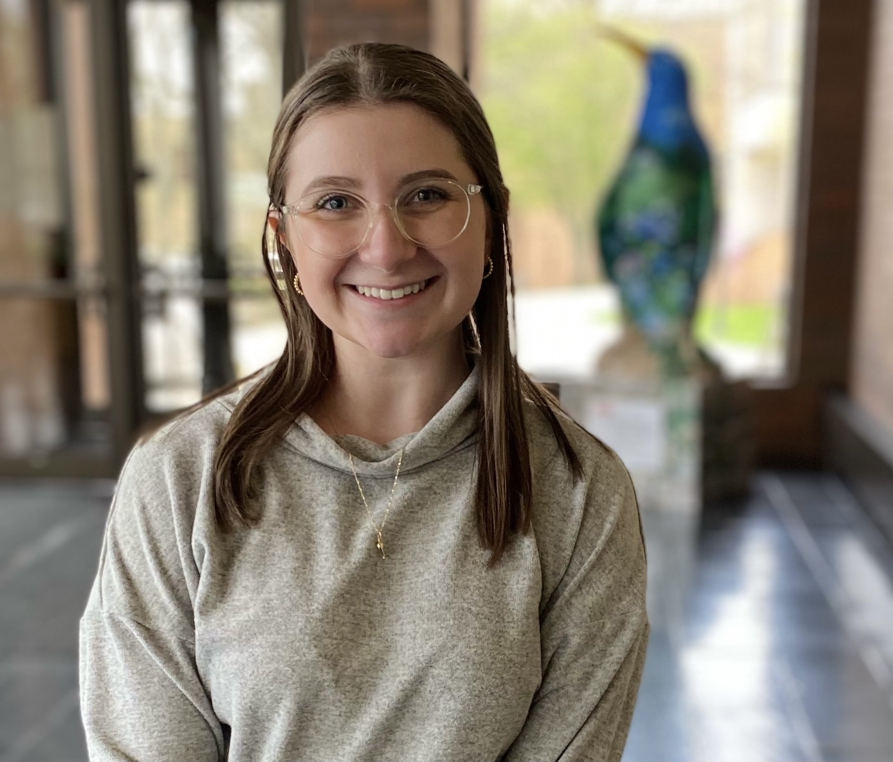 Alyssa Osman poses in the lobby of Tod Hall