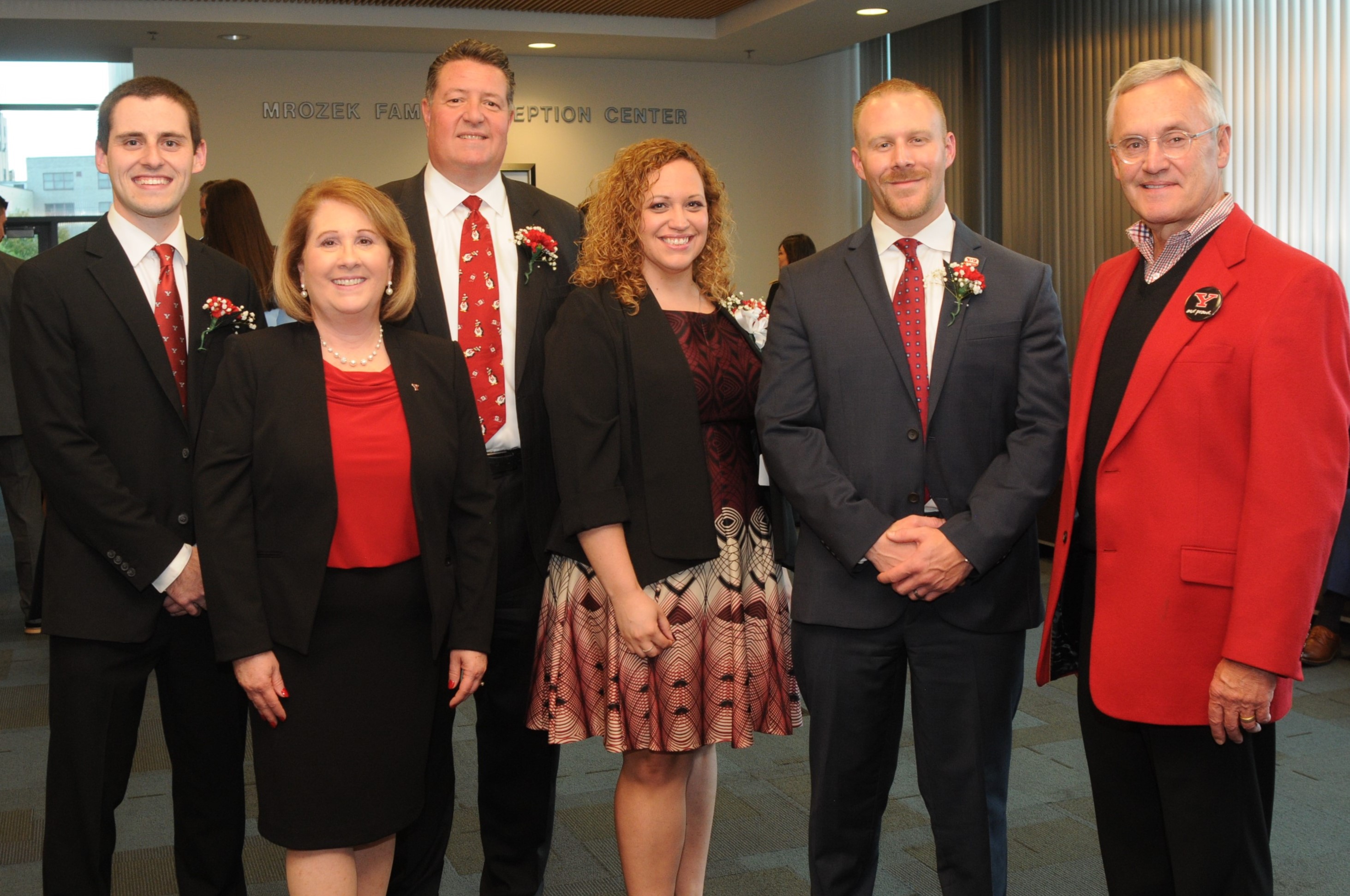 (L-R) Michael Metzinger, CPA, senior manager, HBK CPAs & Consultants, Outstanding Recent Alumnus; Betty Jo Licata, PhD, Dean; David Coy, president/general manager, WKBN/WYFX-TV and WYTV/MyYTV, Outstanding Business Alumnus; Lisa Metzinger, CPA, partner, Cohen & Company, Outstanding MBA Alumna; Todd Finn, CFA, assistant vice president, Farmers Trust Company, Outstanding Recent Alumnus are congratulated by President James Tressel at the 24th Annual Williamson College of Business Administration Banquet held Oct. 11.