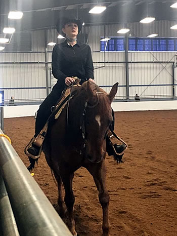 YSU equestrian student on horseback