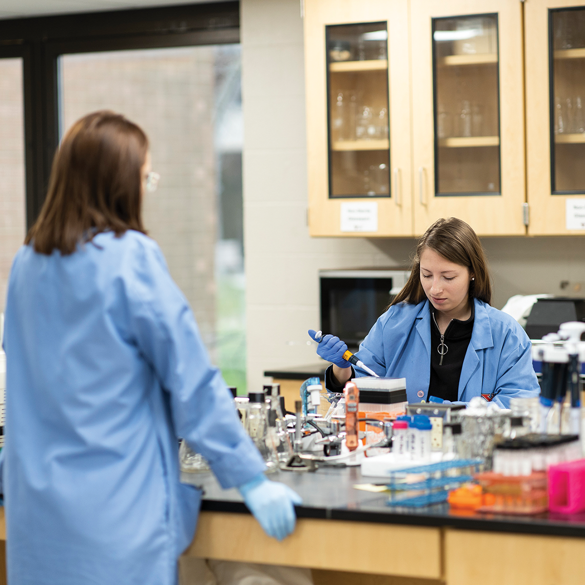 Two female students in a lab