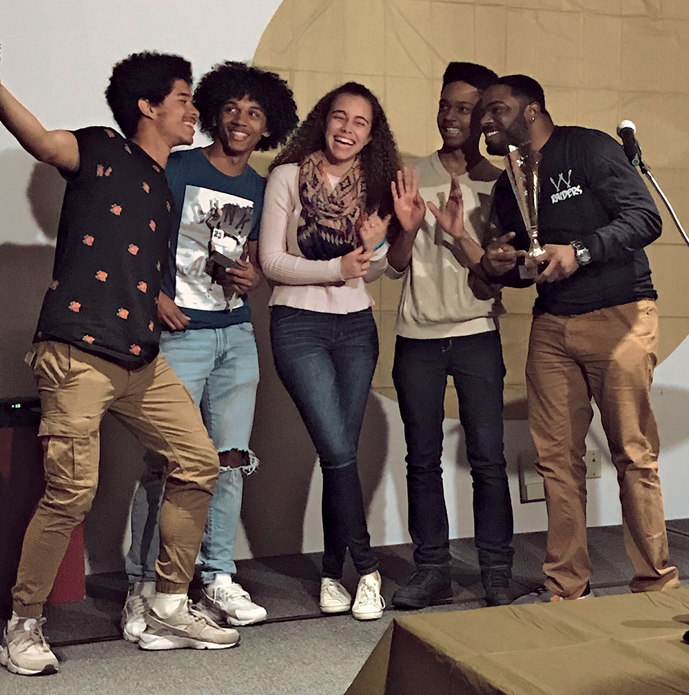 High school students participate in a poetry slam