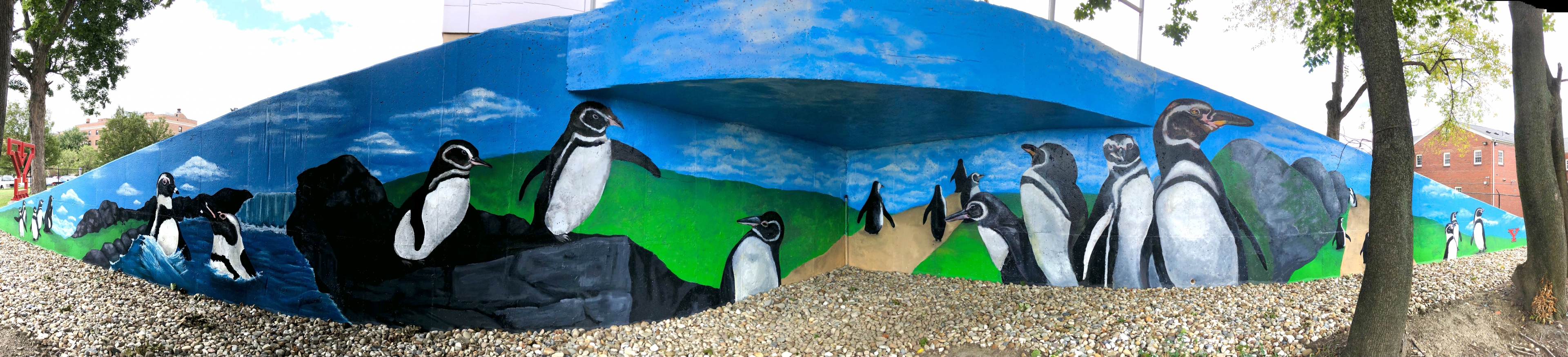 A 60-foot by 13-foot panoramic mural on campus that features 24 majestic penguins.