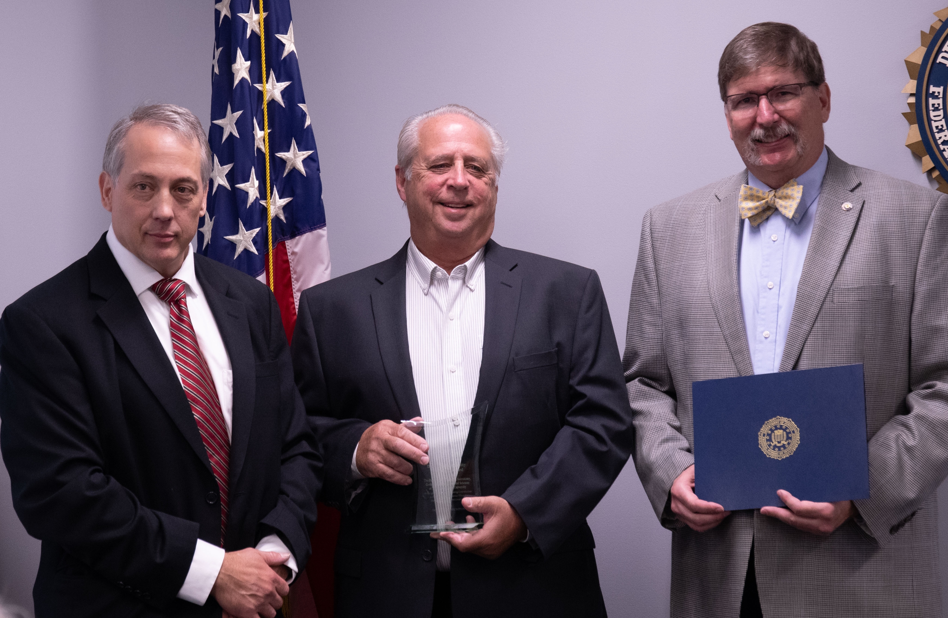 YSU faculty receiving the FBI Director’s Community Leadership Award