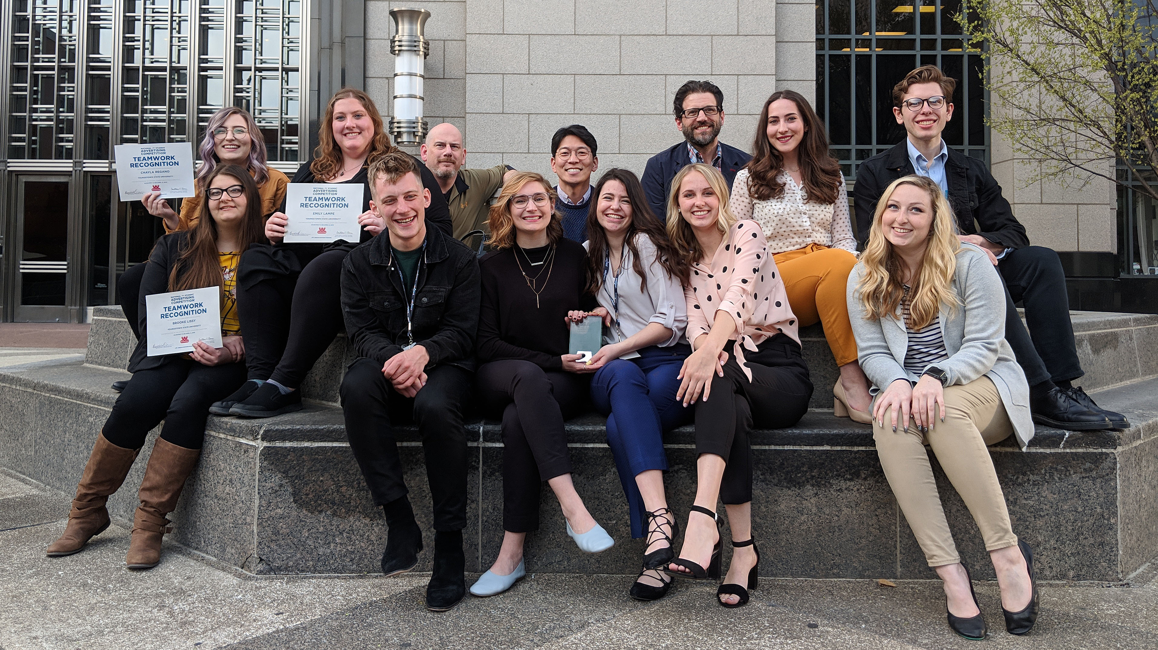 The YSU Ads Club came in third overall, and senior Anna Henkels won the Best Presenter Award, at the American Adversiting Federation's National Student Advertising Competition. From the left are, first row, Chayla Regano, Brooke Lissy, Emily Lampe, Jacob Zillinger, Anna Henkels, Jessica Hood, Zoey Novack, Breanna Irwin, and back row advisors Rich Helfrich, Doori Song, Michael Pontikos, and Megan Factor, Gryphon Johnson.