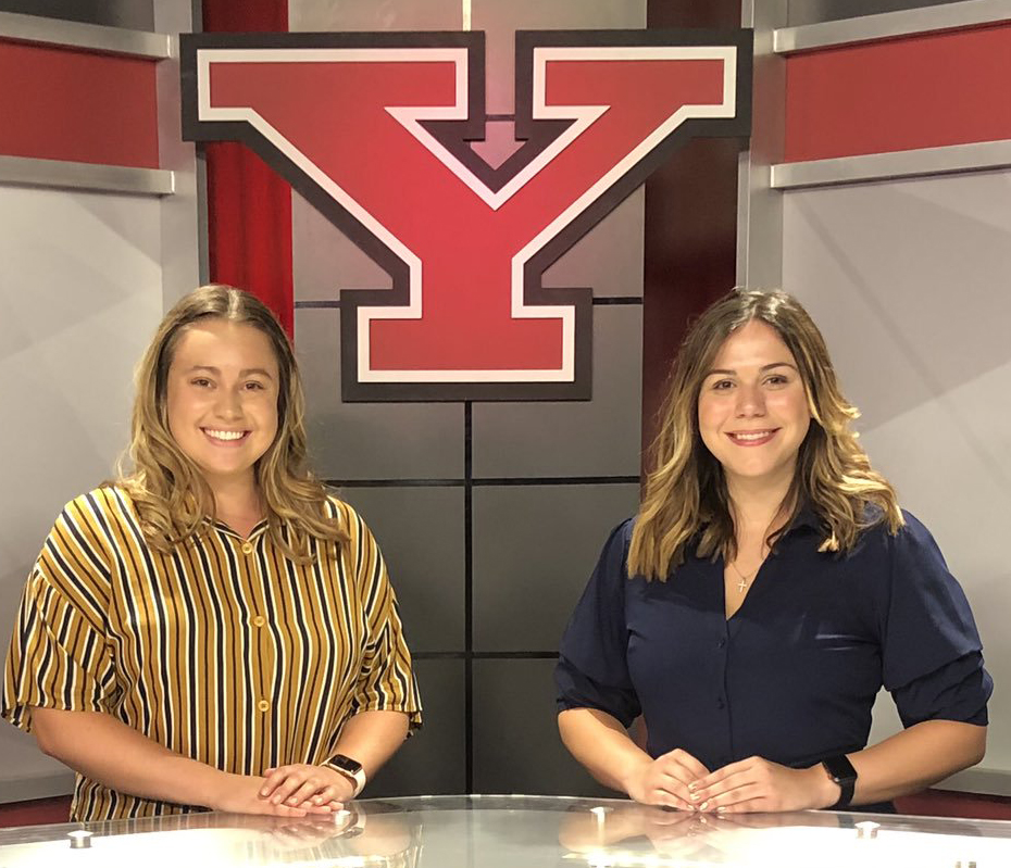 YSU students Amanda Joerndt, left, and Rachel Gobep, members of the news team, pictured on the set of Jambar TV in Bliss Hall.