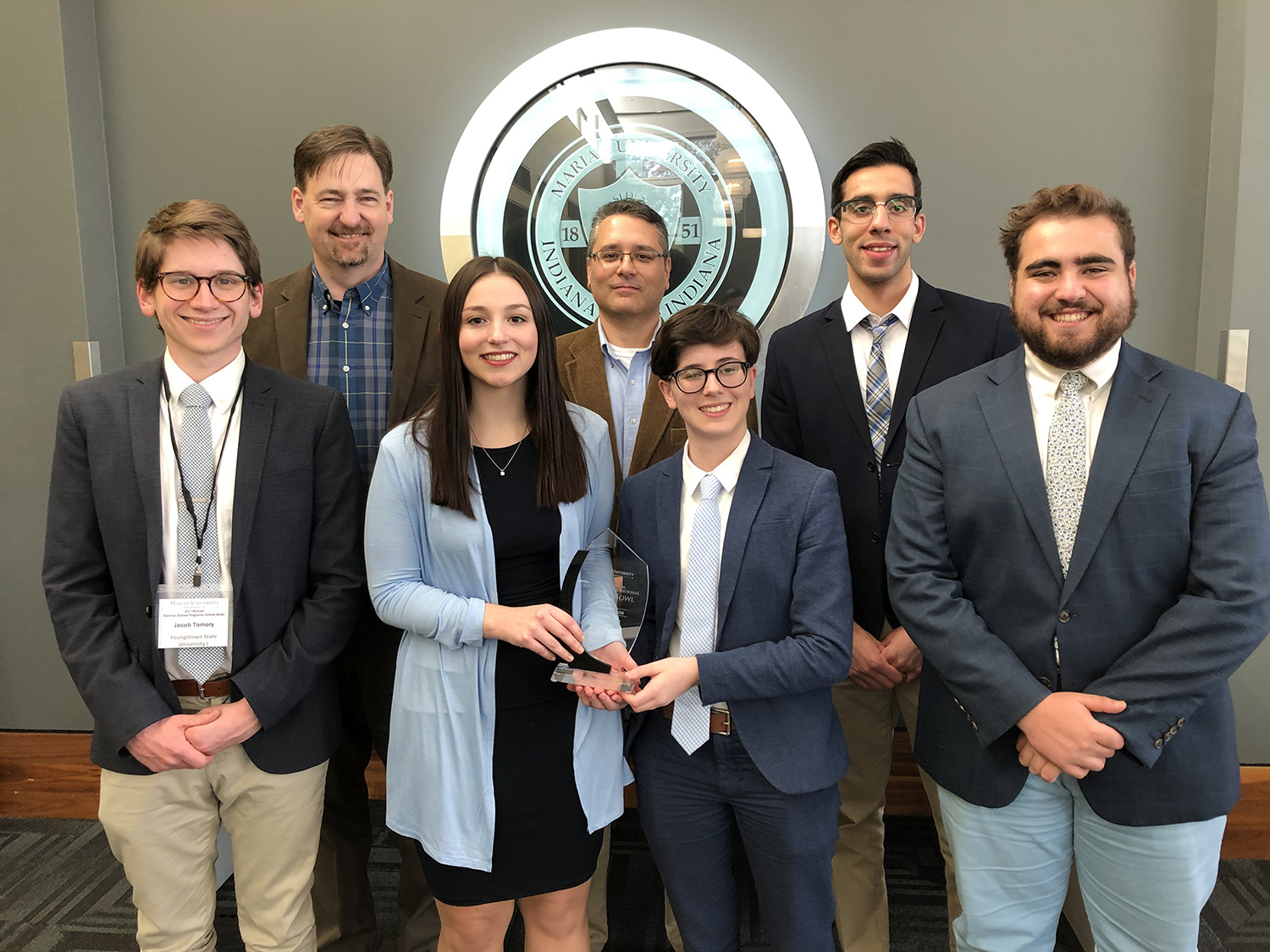 YSU's winning Ethics Bowl team, from the left, Jacob Tomory, Alan Tomhave (coach), Samantha Fritz, Mark Vopat (coach), Eva Lamberson, Moataz Abdelrasoul, and Michael Factor