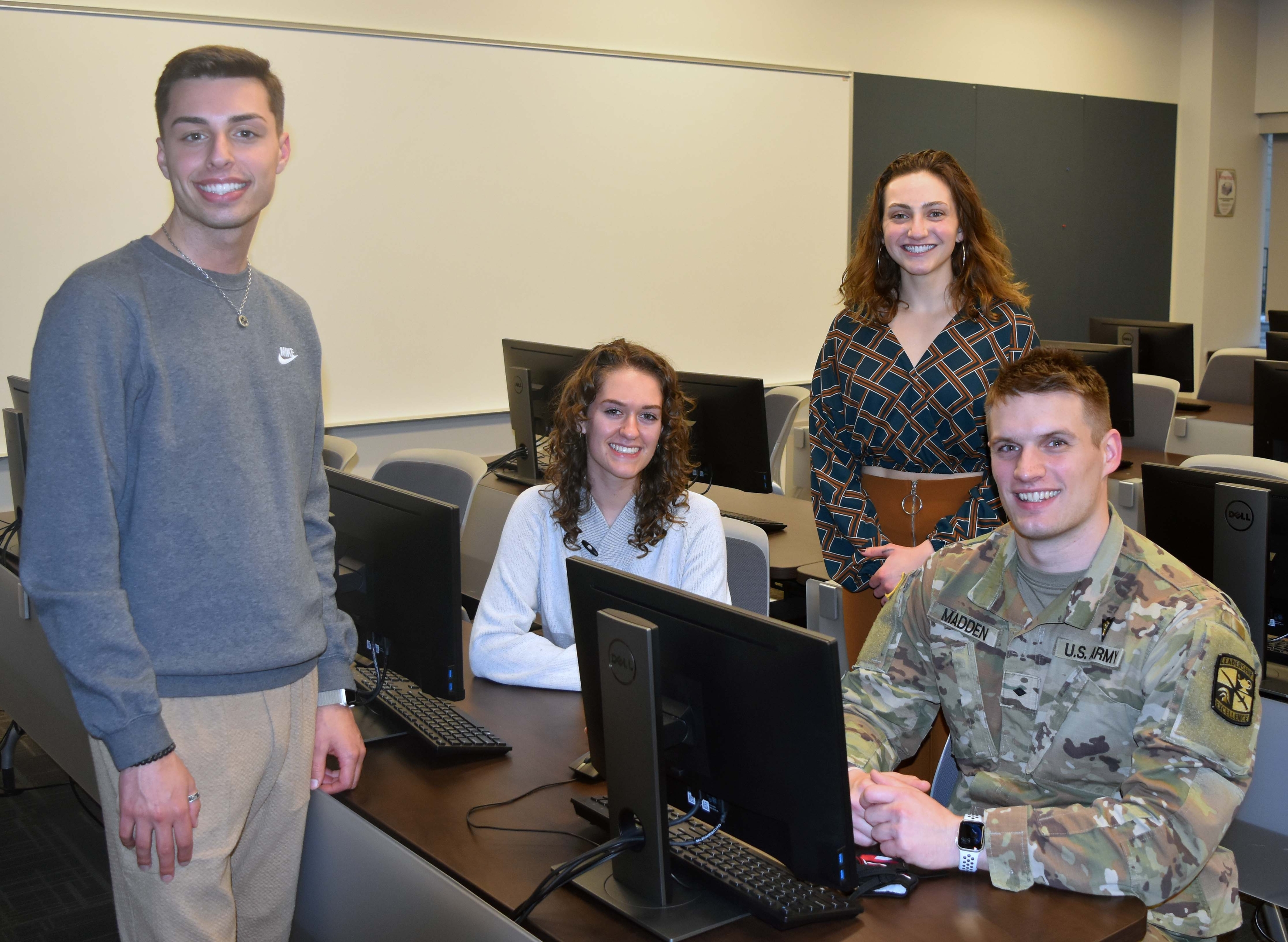 Michael Puhalla, Cassandra Tomlin, Carly Calderone and Sam Madden