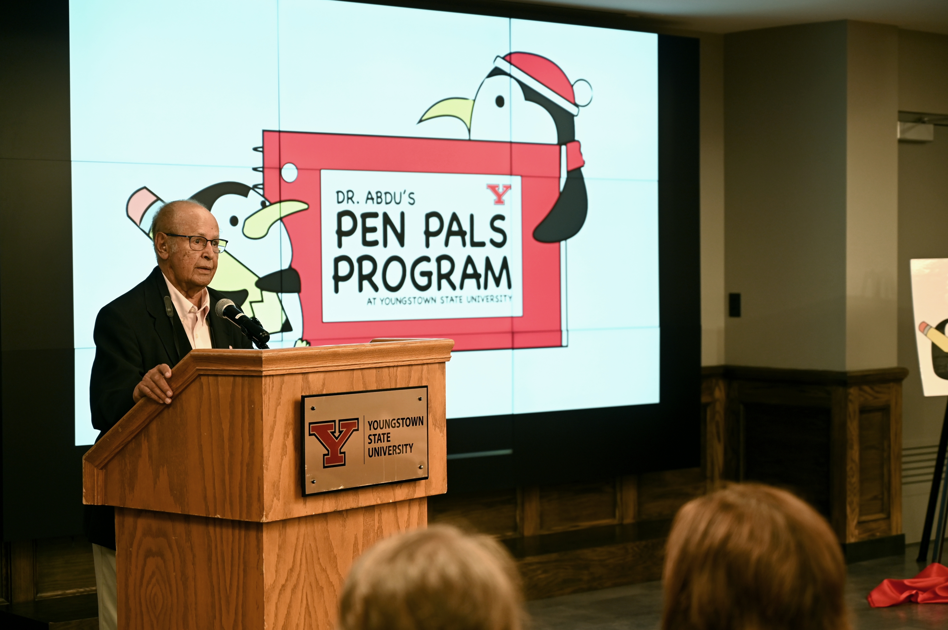 Dr. Abdu addresses the audience during the unveiling of the newly-named Dr. Abdu Pen Pals Program