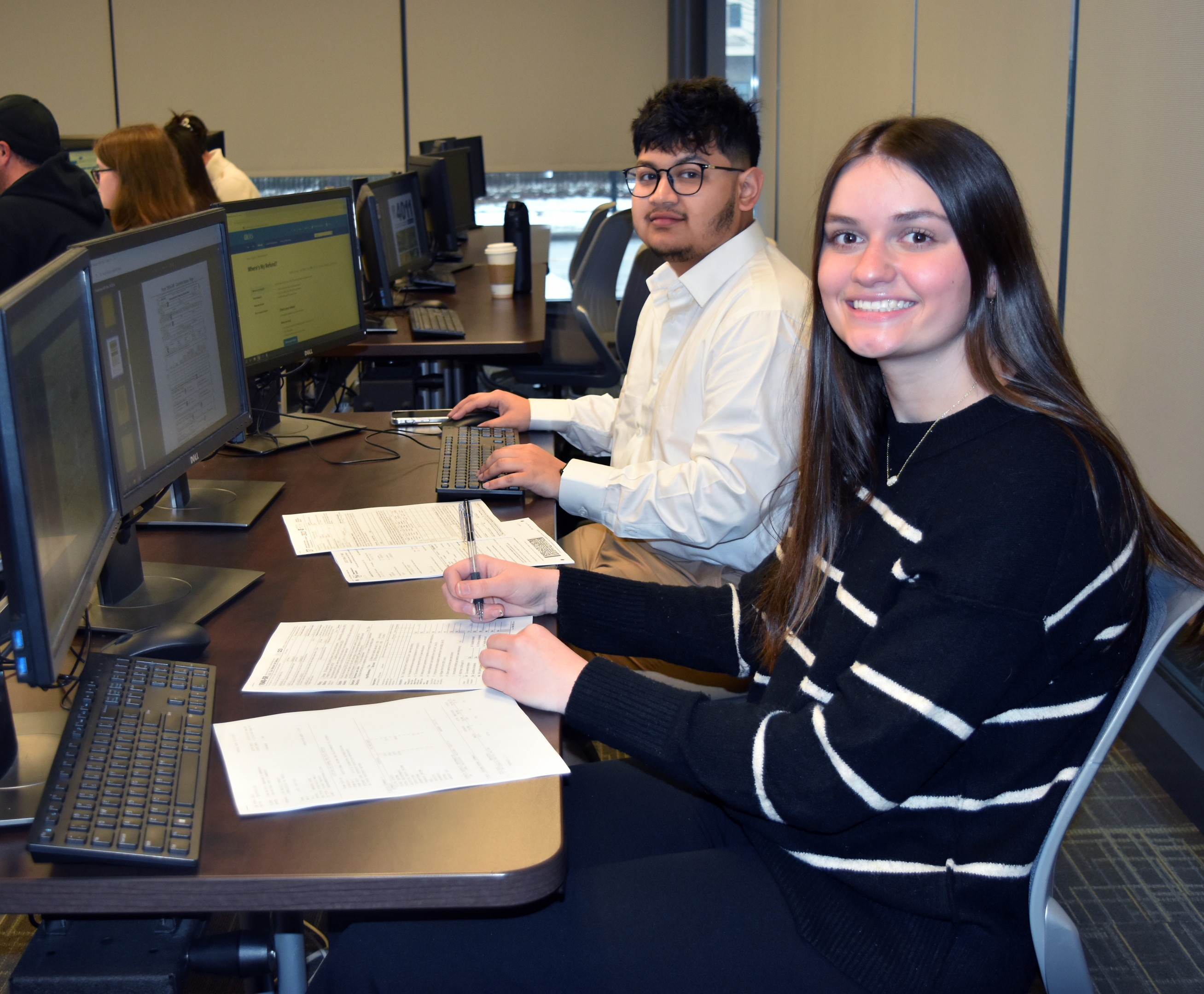 WCBA student volunteers, G M Mohiuddin Rahman and Emily Wilson