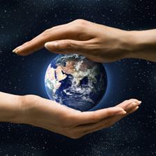 two hands holding the world