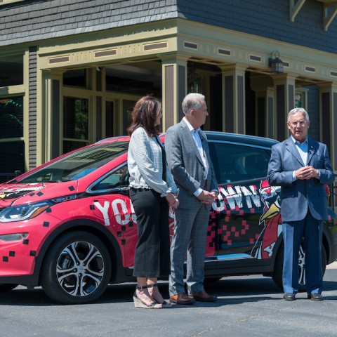 Greg Greenwood, president of Greenwood Chevrolet, and his wife, Alice, present keys to YSU President Jim Tressel.