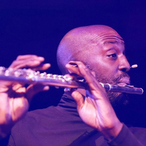 Jason Moncrief playing the flute