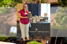 Dr. Amy Fluker poses with her new book at the Society for Civil War Historians conference