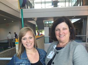 Olivia Millsop, left, with her internship mentor Dr. Elena Rossi, a Youngstown pediatrician