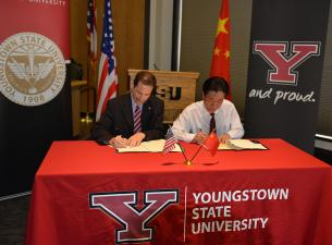 YSU and Chengdu Tech University sign agreement.