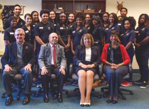 Seventeen Youngstown State University freshmen are mentoring with senior campus leaders and gaining 