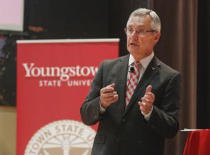 YSU President Jim Tressel giving a speech 