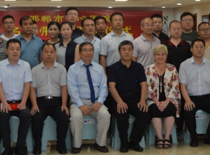 Seated from the left are Dr. Lixing Zhang, Vice President, Quzhou County Hospital; Dr. Wenming Li, D