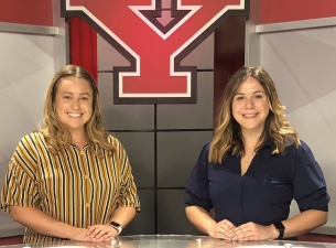 YSU students Amanda Joerndt, left, and Rachel Gobep, members of the news team, pictured on the set o