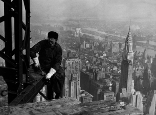 This photo from the National Archives of a worker on the framework of the Empire State Building in N