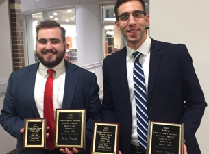 Michael Factor, left, and Moataz Abdelrasoul after winning the Cleveland Marshall Regional Moot Cour