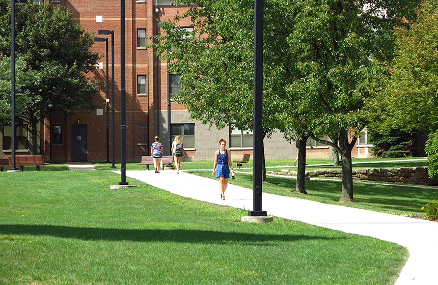 ysu students walking near Cafaro House